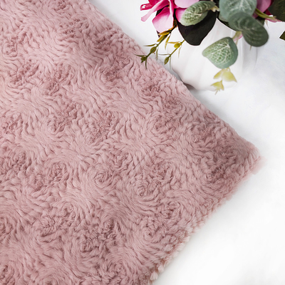 A tela cor-de-rosa da pele do falso do poliéster fez malha 58/60" para o coelho da flor da roupa