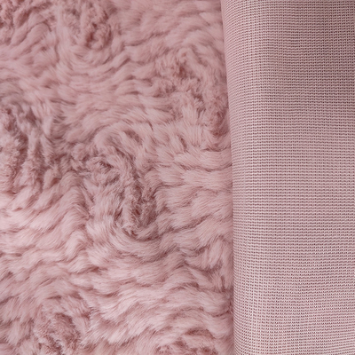A tela cor-de-rosa da pele do falso do poliéster fez malha 58/60" para o coelho da flor da roupa