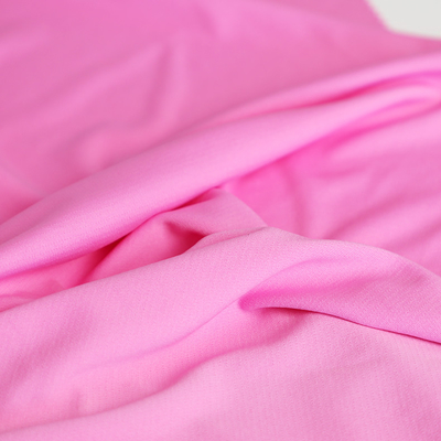 Planície cor-de-rosa do tecido de algodão 100gsm da malha da camisa de T única
