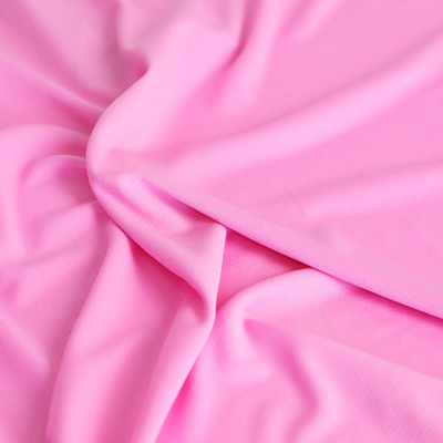 Planície cor-de-rosa do tecido de algodão 100gsm da malha da camisa de T única