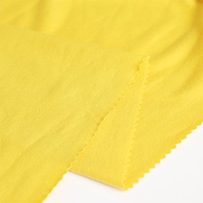 O algodão fez malha a única tela 100gsm do jérsei para a camisa ensaca o alinhamento