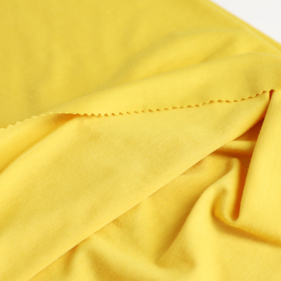 O algodão fez malha a única tela 100gsm do jérsei para a camisa ensaca o alinhamento